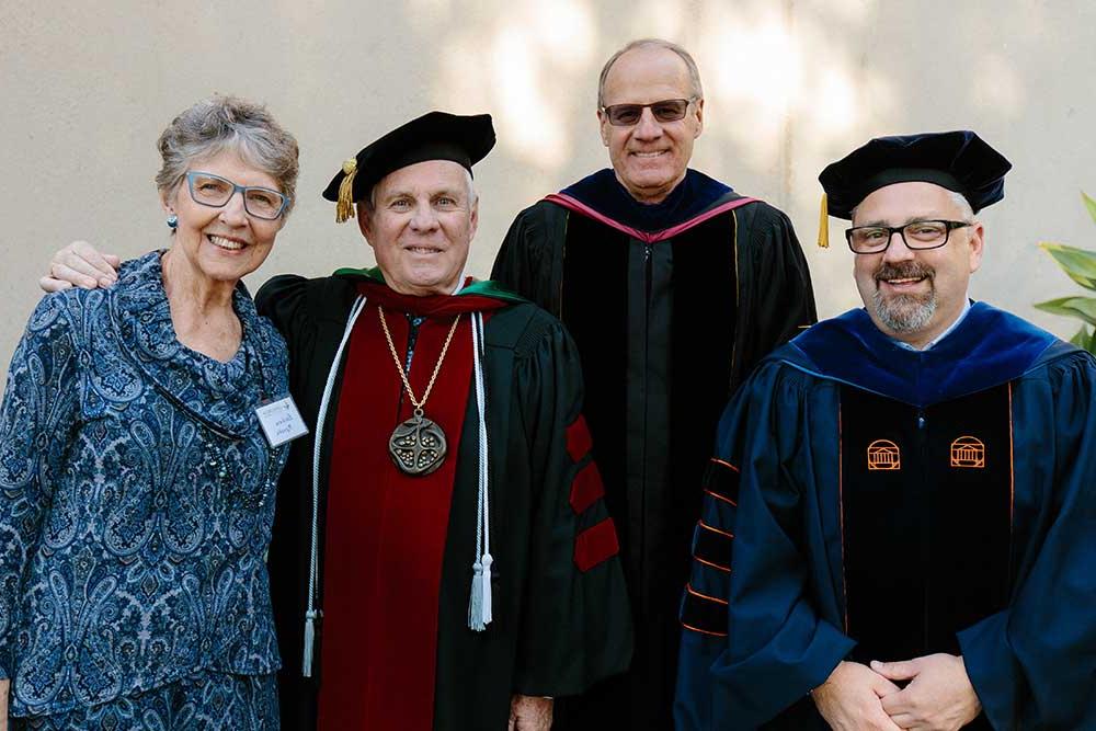 President Thomas posing with other guests