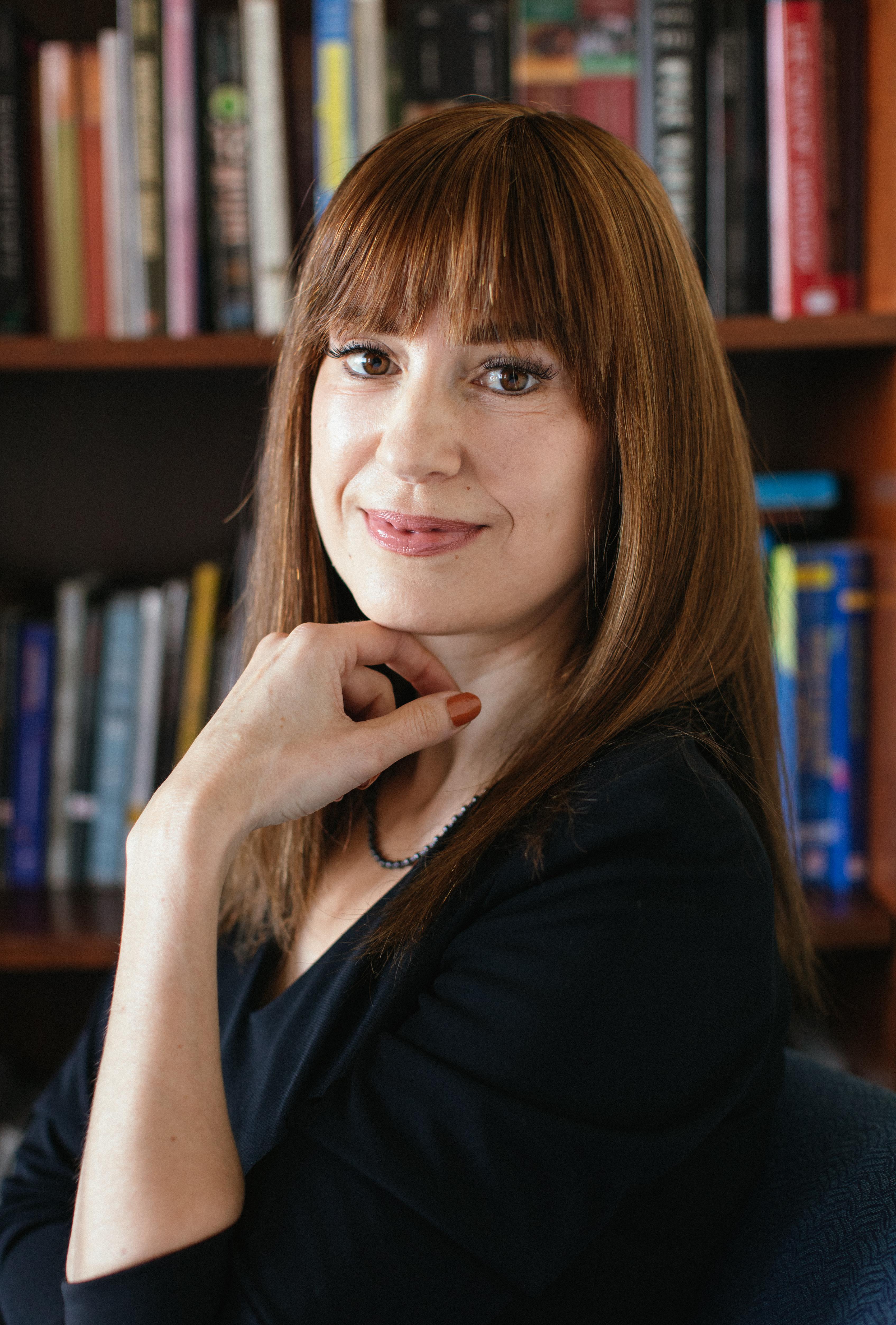 Headshot of Dr. Camelia Raghinaru